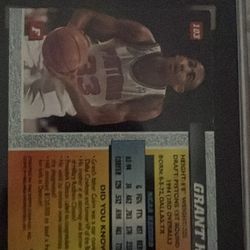 It is a 1994 Topps Embossed Golden Idols card featuring Grant Hill, graded by SGC as 80