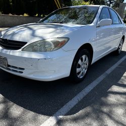 2003 Toyota Camry 4 cylinder 152 k miles ONE OWNER CLEAN TITLE no leaks no issues smog cold ac oil change filter new brakes tune up v nice paint and b