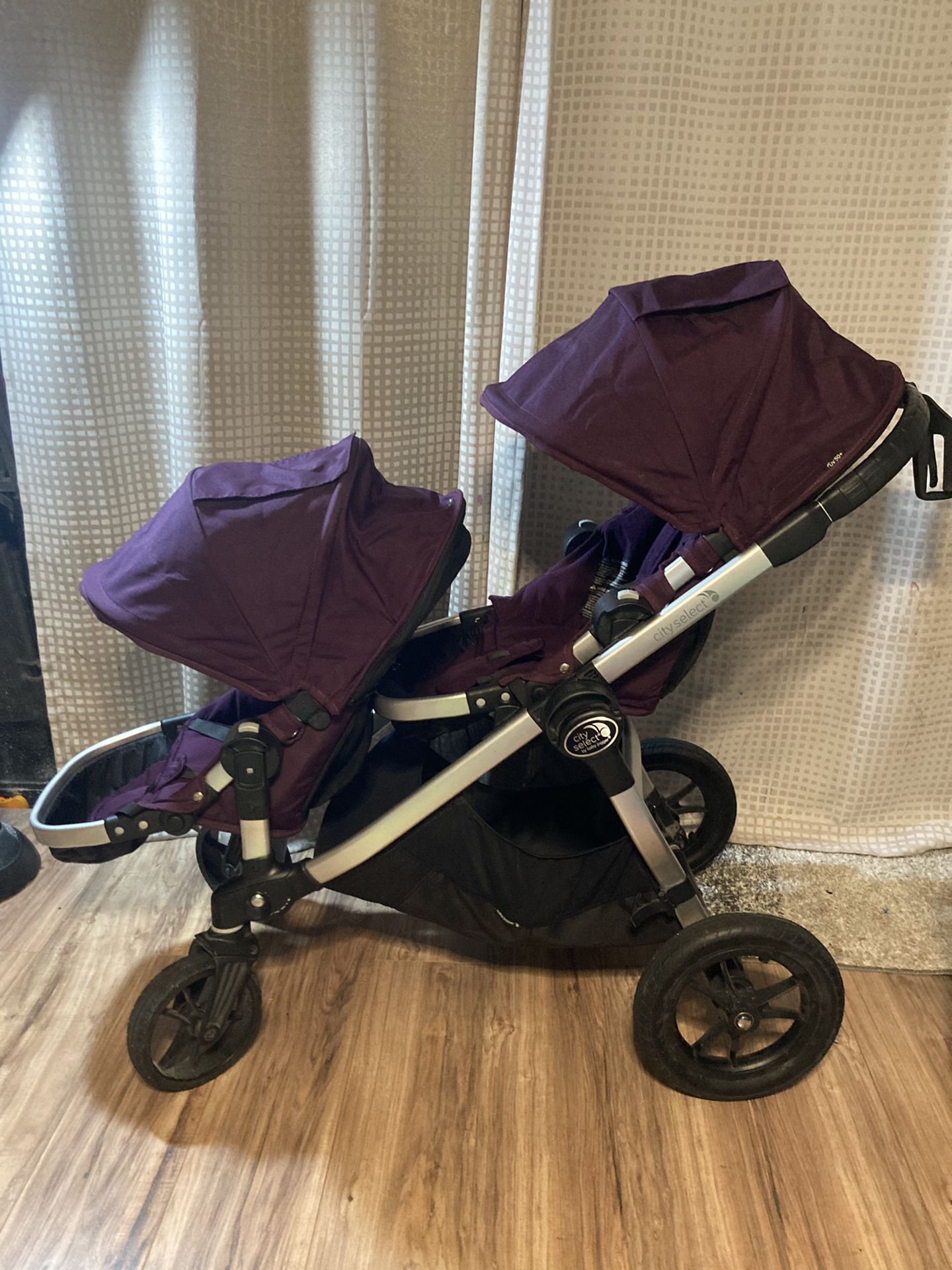 Stroller Baby Jogger City Select double tandem stroller in purple
