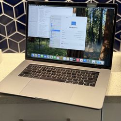 2019 Apple MacBook Pro 15” i7 16GB Ram TouchBar / TouchID. Finance Available! 