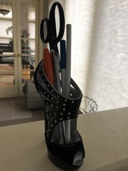 Rhinestone black Stiletto. Holds pens and makeup brushes