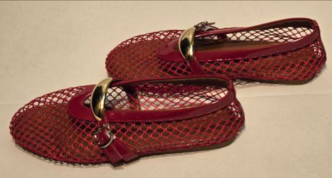 A pair of jelly mesh shoes with gold detail size 9