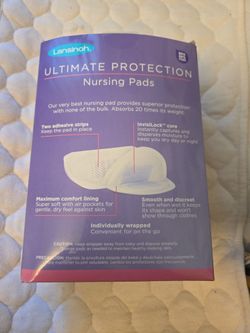 Milk storage bags and 2 boxes of breastfeeding pads