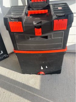 Used toolbox with two compartments, in good condition.