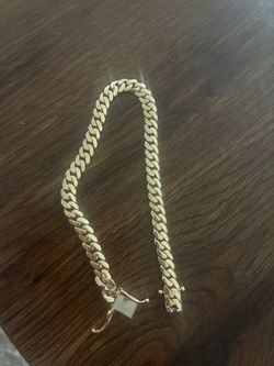 17 grams  Cuban link with clasp  14k