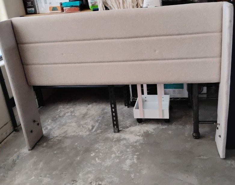 For sale: Nice, fairly new full-size bed frame.
Includes: headboard, footboard, side rails, all hardware, and all wooden slats/slides. Gently used in