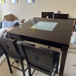 Wooden Dining Table And Four Chairs