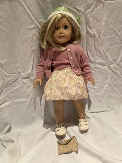 Kit Kitteridge American Girl doll with buffalo nickel in handbag