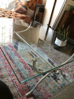 Vintage glass coffee table with wrought iron frame