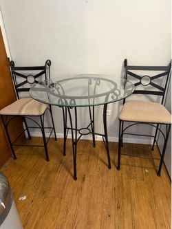 Small glass kitchen table and chairs