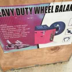 Heavy duty tire balancer
