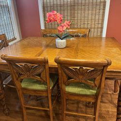 Dining table Solid Wood/6 Chairs, Intricate Carved Details, Leaf Folds Inside Table To Make Square. Perfect square for small space and open to large r