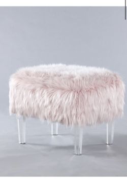 Pink fur ottoman with acrylic lucite legs