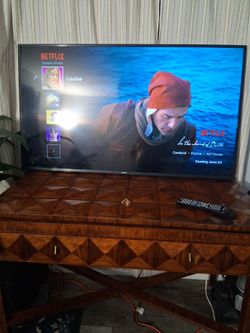 65 inch smart TV with remote