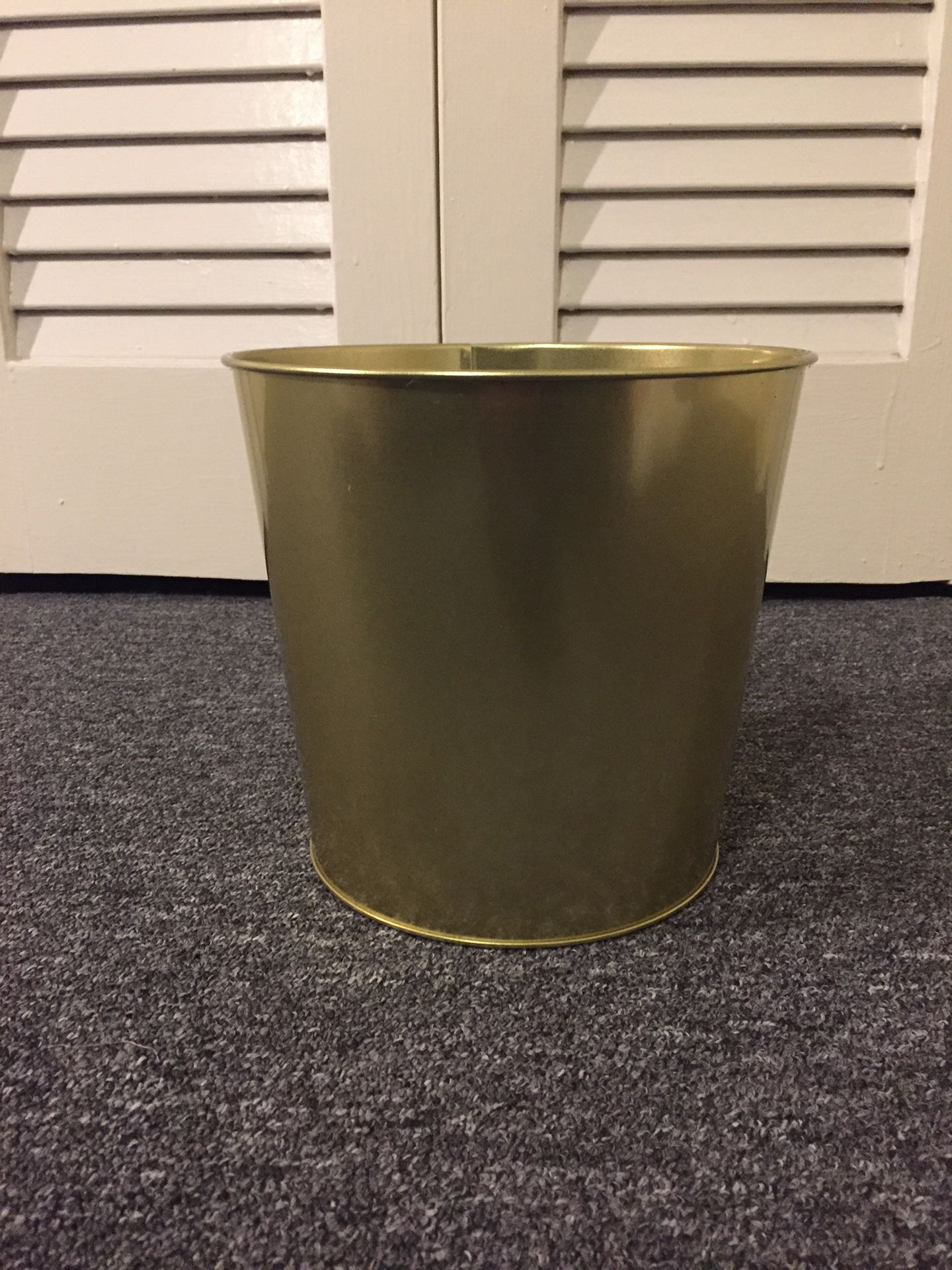 Brass colored plant pot