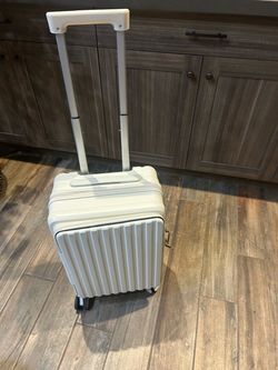 White Hard Shell Carry-On Luggage, also available in pink and black size is 22” price is per I