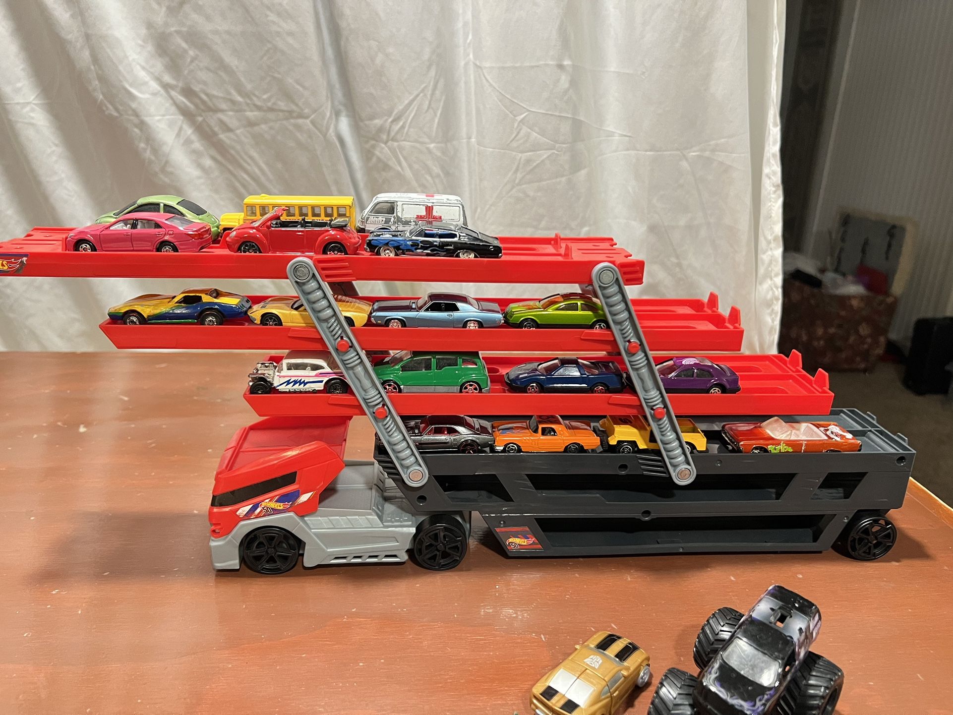 Hot Wheels Mega Hauler Truck The cars are from different companies