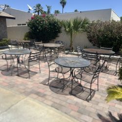 Heavy Wrought Iron Tables (3)  48” (2)  38”  & Chairs