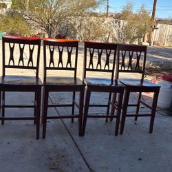 Four wood chairs, no table