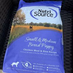 DOG FOOD NEW. 26 POUNDS. EXP. 2026 May 