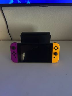 Nintendo Switch with Purple and Orange Joy-Cons