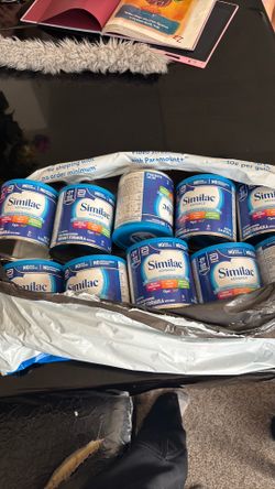 10 brand new cans of Similac milk