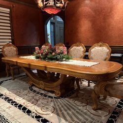 Needs to be sold ASAP- Dining table, Real Wood AICO by Michael Amini (+10 Chairs if desired)