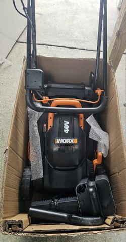 NEW PUSH LAWN MOWER ....14 INCHES....FOR SMALL YARDS....CHARGER, 2 BATTERIES AND SMALL VACUUM INCLUDED...NEW...$ 200