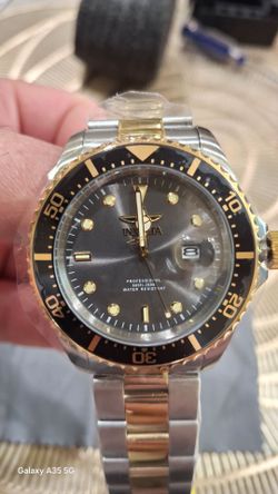 18 Karat gold Invicta swiss watch
