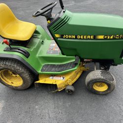 John Deere GT242 With The Kawasaki 14hp Engine. 38”Mower Deck. Runs And Works Great. A Genuine Deere