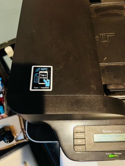 Like new, Samsung Xpress M2070FW Laser Printer with 5 MLT-D111S Toner Cartridges