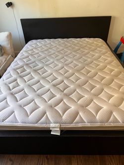 Queen Mattress with Dark Wood Bed Frame