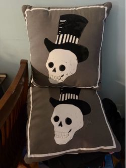 Set of two skull pillows