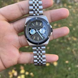 JAMES MCCABE STURGIS CALENDAR silver tone watch with jubilee bracelet