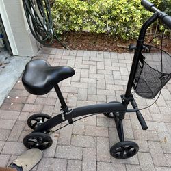 Knee scooter with chair