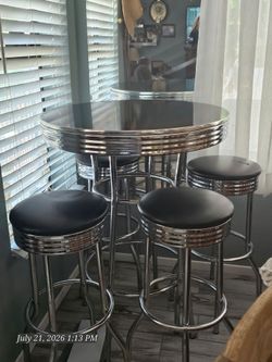 50s Diner black & chrome Bistro table with 4 stools. Paid 260 originally, good condition
