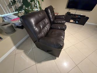 Pair of Brown Faux Leather Recliner Chairs