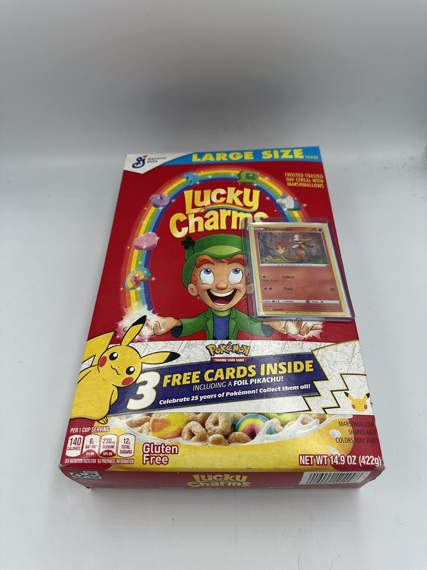 Pokémon 25th anniversary Lucky Charms Cereal Box with Booster Pack & Charmander reverse holo Card Bundle