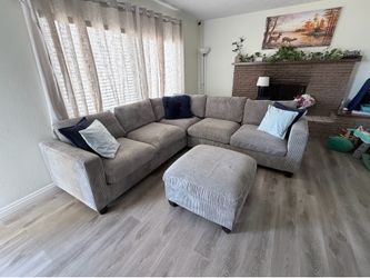 Sectional with ottoman plus free small recliner