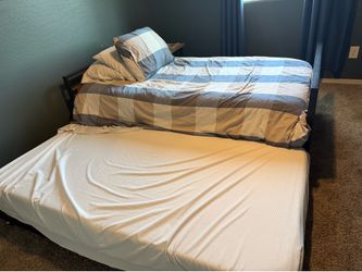 Two twin mattress with twin bed frame and trundle $250obo