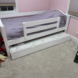 Twin Bed With Rolling Trundle