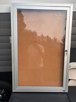 Bulletin board enclosed