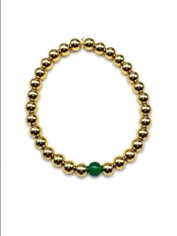 Gold colored bracelet