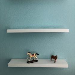 White floating shelves, total of 8