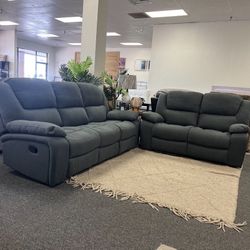 Grey Sofa and Loveseat with Recliners on each end 