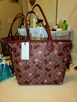 Tote Bag comes with matching wallet.