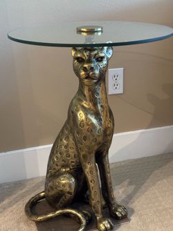 Brass leopard side table