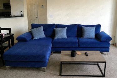 Free Delivery Today! Steam Cleaned! Like new Blue sectional couch with pillows included. Well kept ! No stains or rips. Clean sofa
