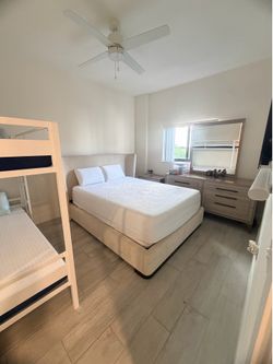 Queen bed and mattress almost new, also night stands and dresser