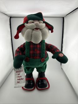 Avon Dancing Santa animated plush figure from 2004 that sings "Shout" and says "Merry Christmas".